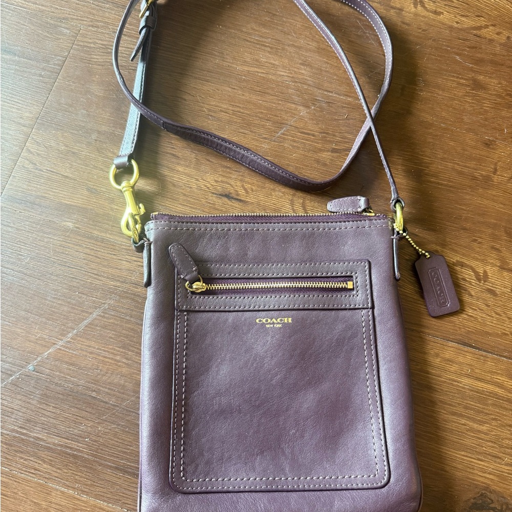 Coach Purple Crossbody Bag with Adjustable Strap and Compact Design